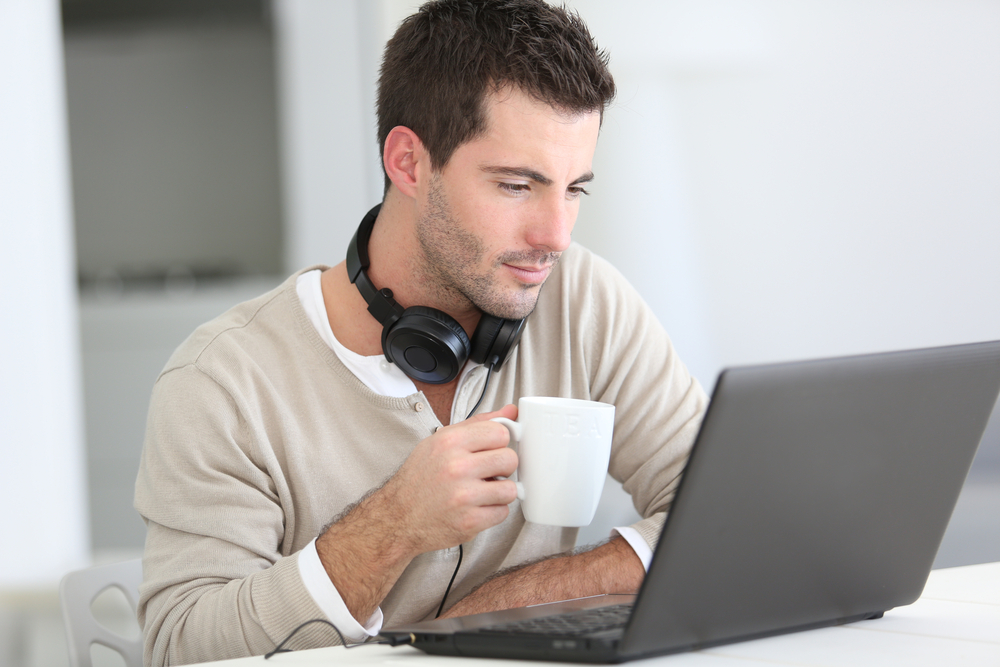 man in front of laptop