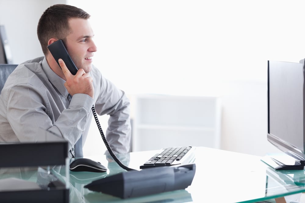 Young businessman talking on the phone